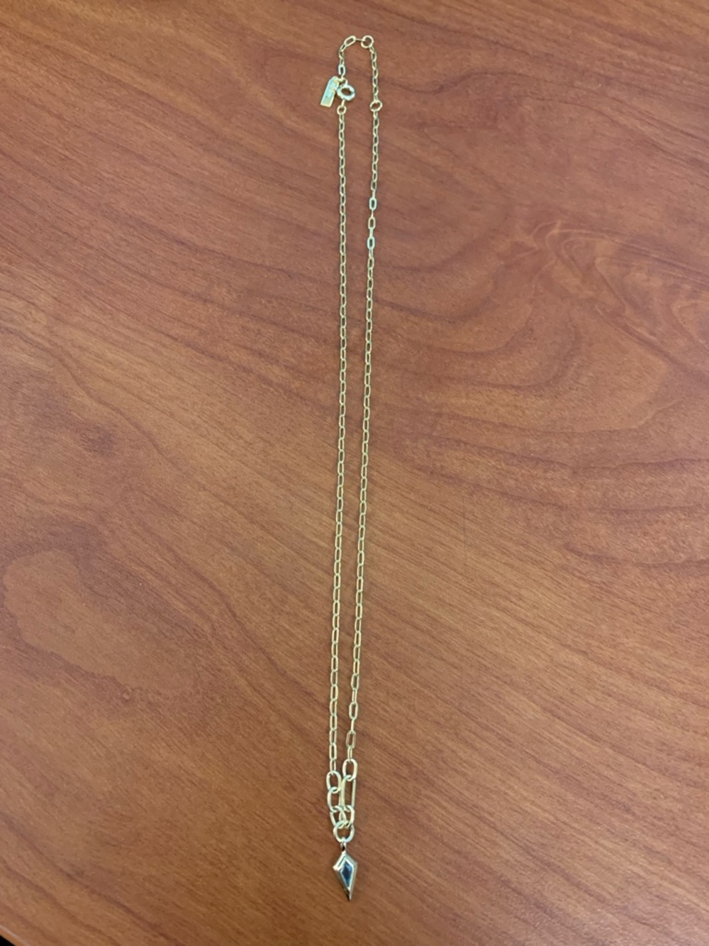 Ania Haie gold tone necklace with blue kite shaped stone. Delicate and beautiful